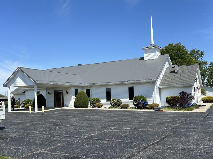 Finished metal roof on a church, with the lot clean and back in use